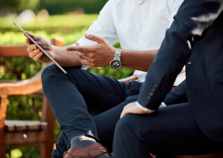 two people sitting during day