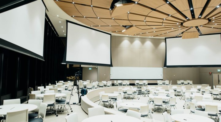 photo of empty room with projector screen